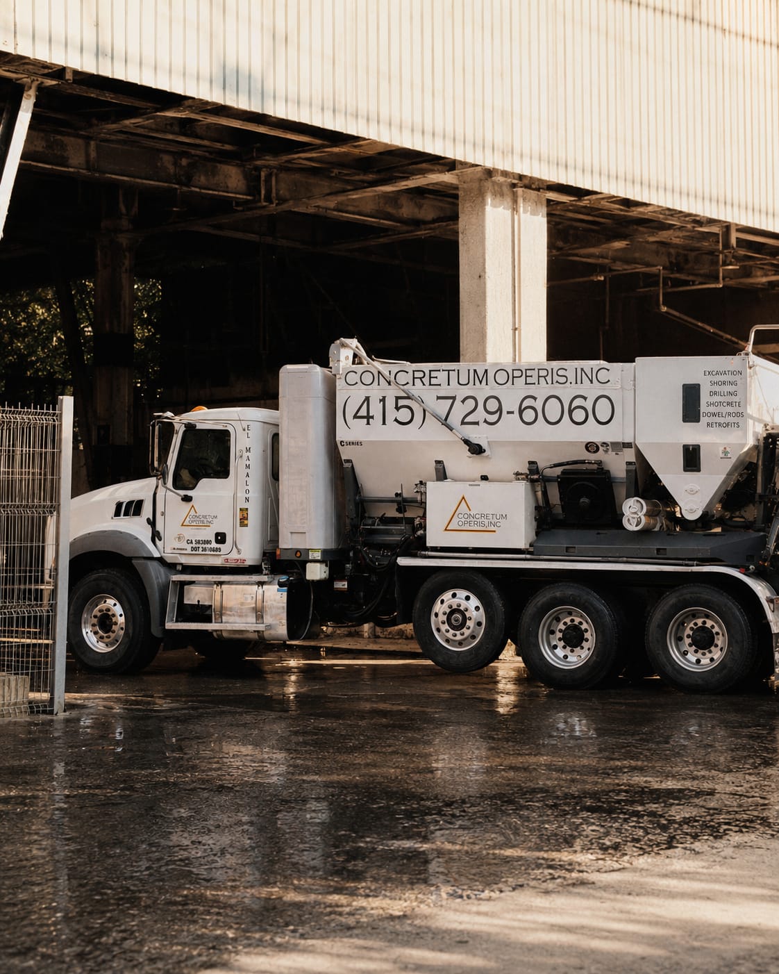 Mixer truck under the depot canopy